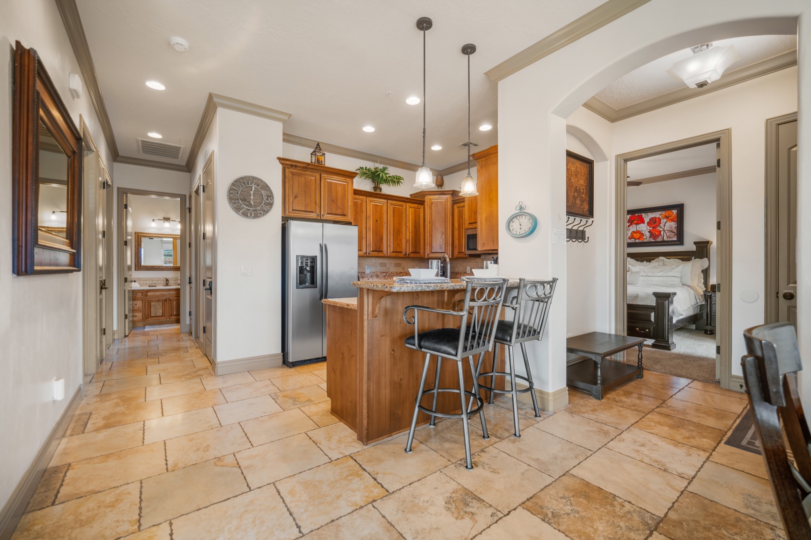 The warm, open kitchen offers ample space & every home comfort