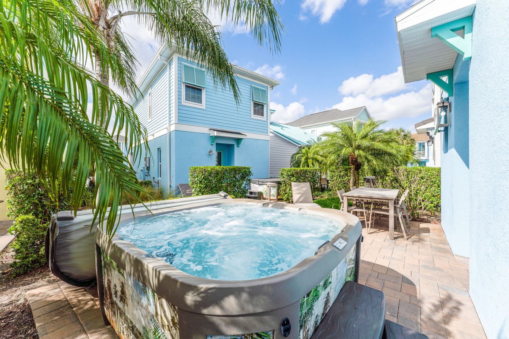 Unwind in the private hot tub, soaking away your cares in the sunshine