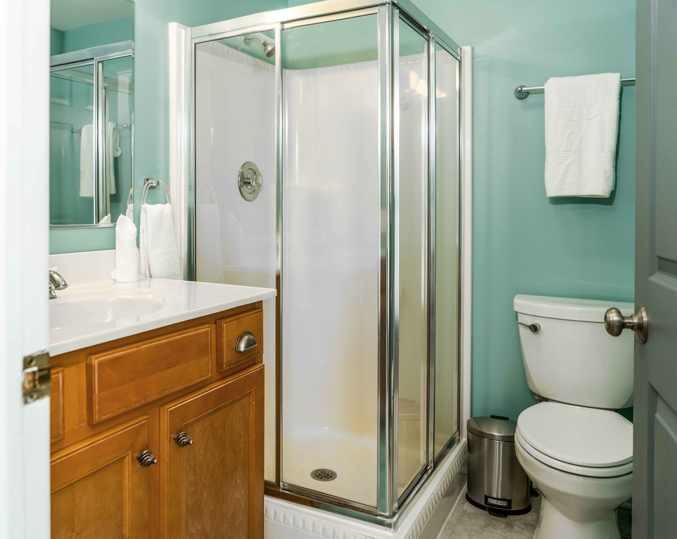 A single vanity & glass shower awaits in the first-floor full bath