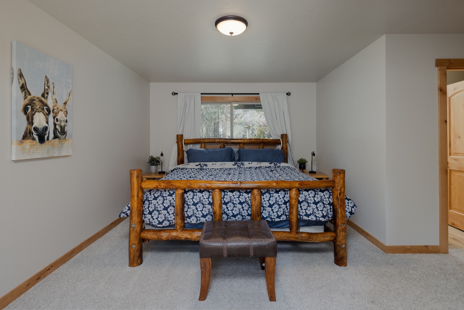 Bedroom 1 with king bed, Smart TV, and ensuite