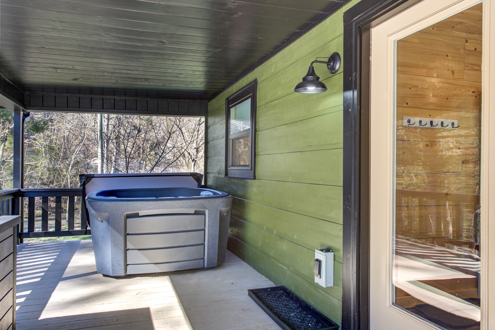 An idyllic retreat: chairs & hot tub, perfect for relaxation