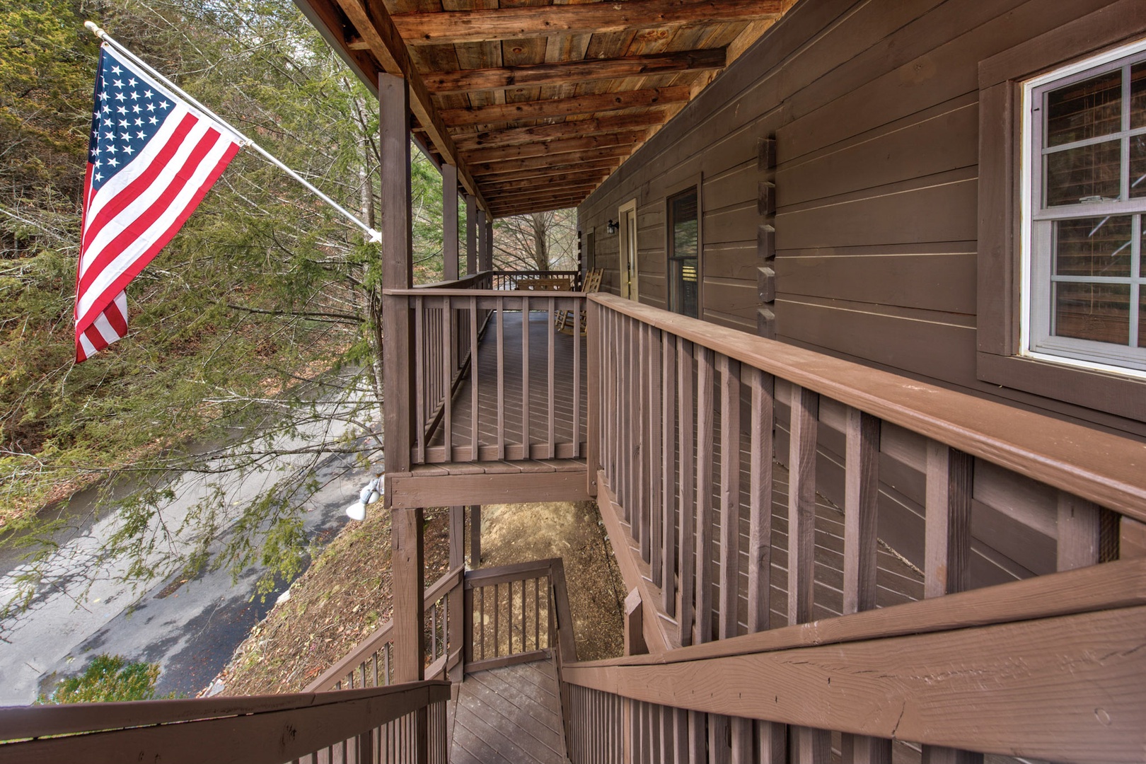 Ascend to the elevated deck and soak in serene nature views before entering