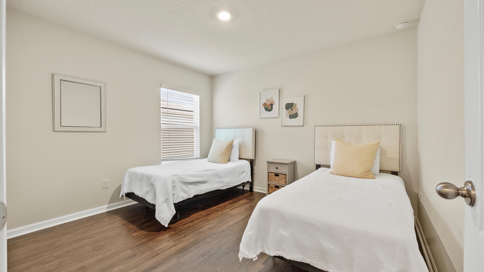 The final bedroom includes two cozy twin beds and a Smart TV