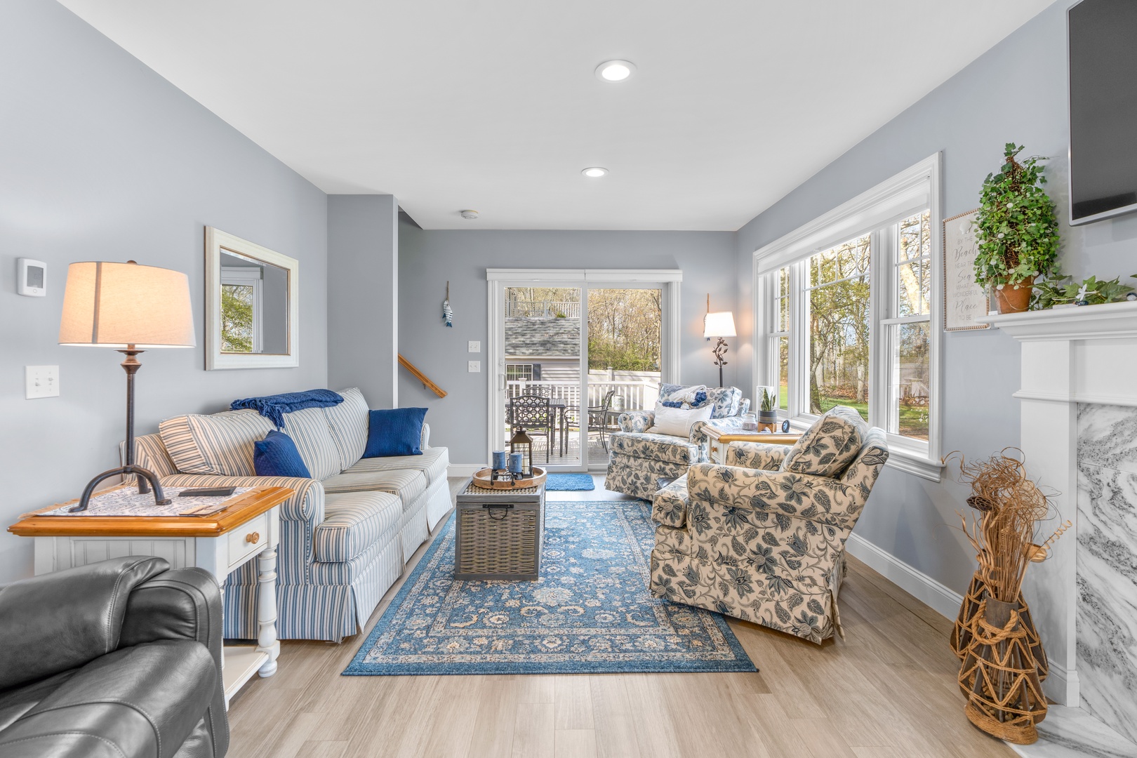 Bright living area with water view, and Smart TV