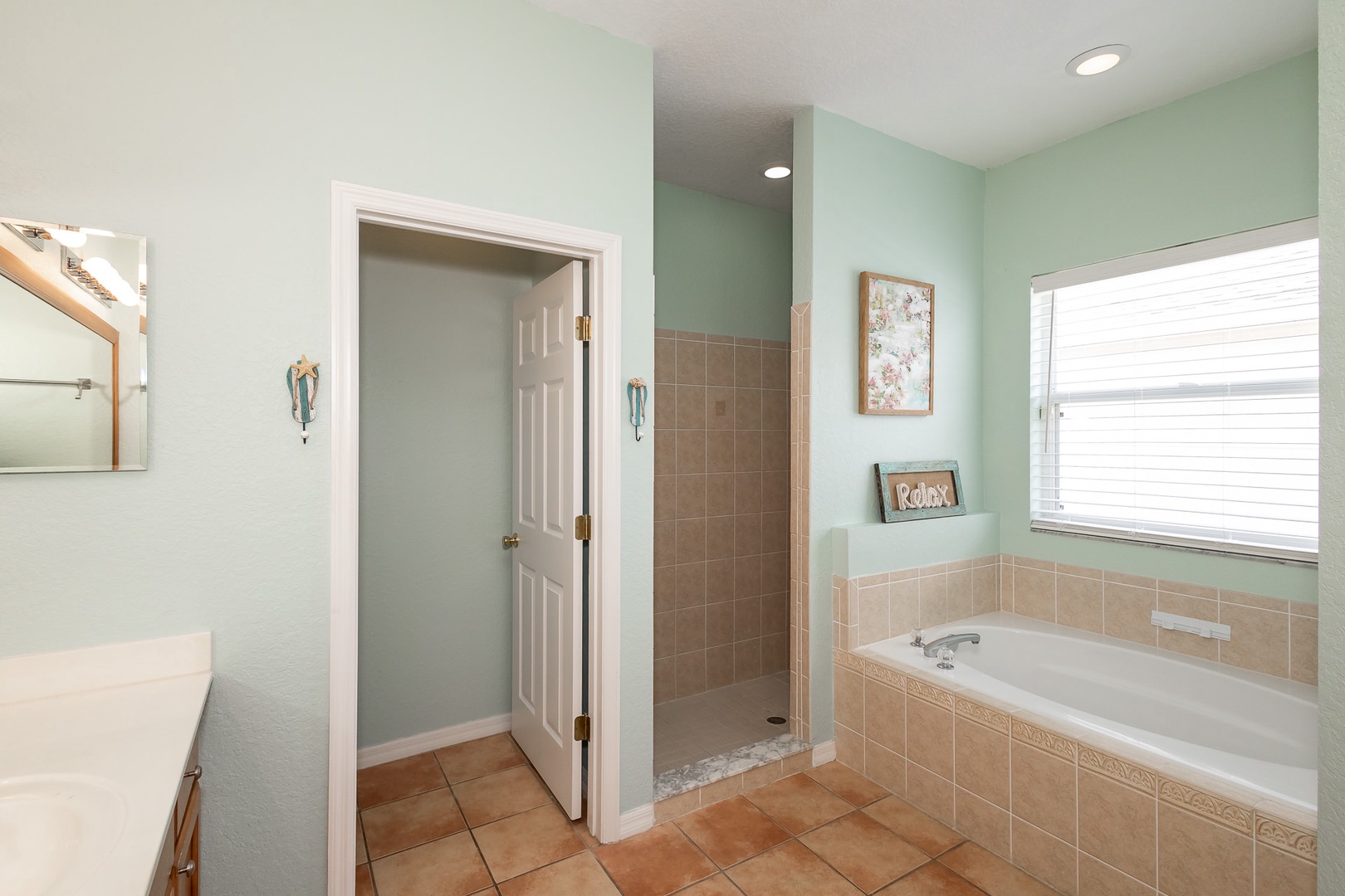 Bathroom #1 with shower and tub attached to bedroom #1