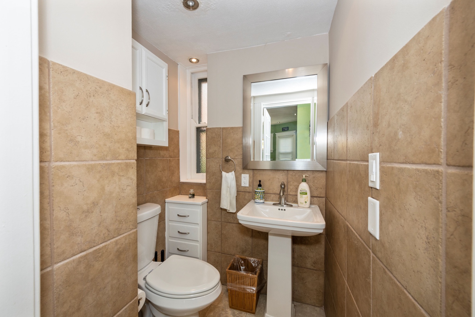 A convenient half bath is tucked away on the main level