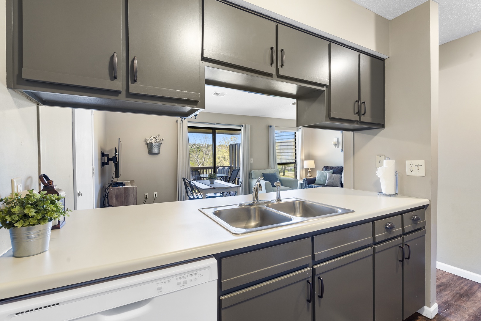 The open, airy kitchen offers ample space & all the comforts of home