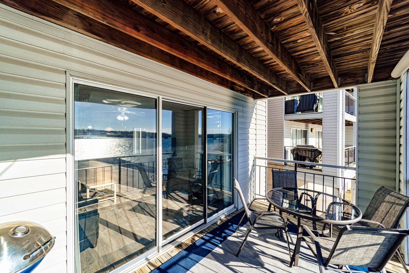 Savor the mesmerizing lake views while nestled in the comfort of the deck