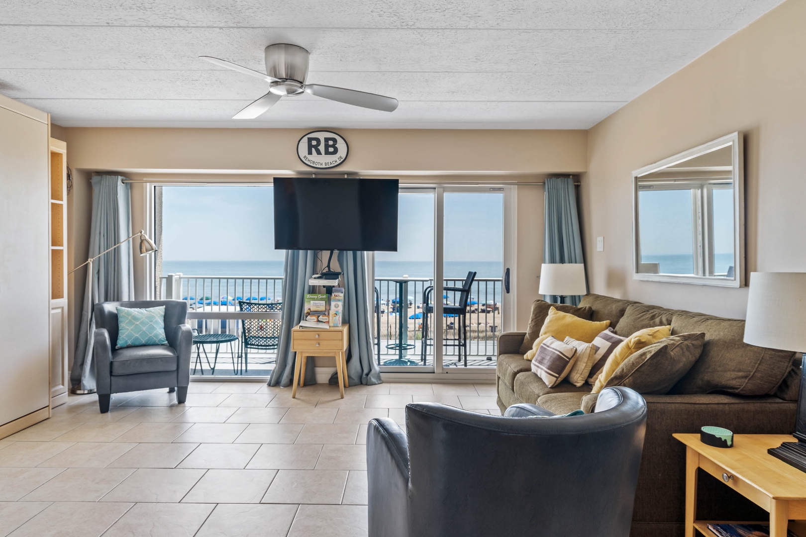 Living room with TV and balcony access