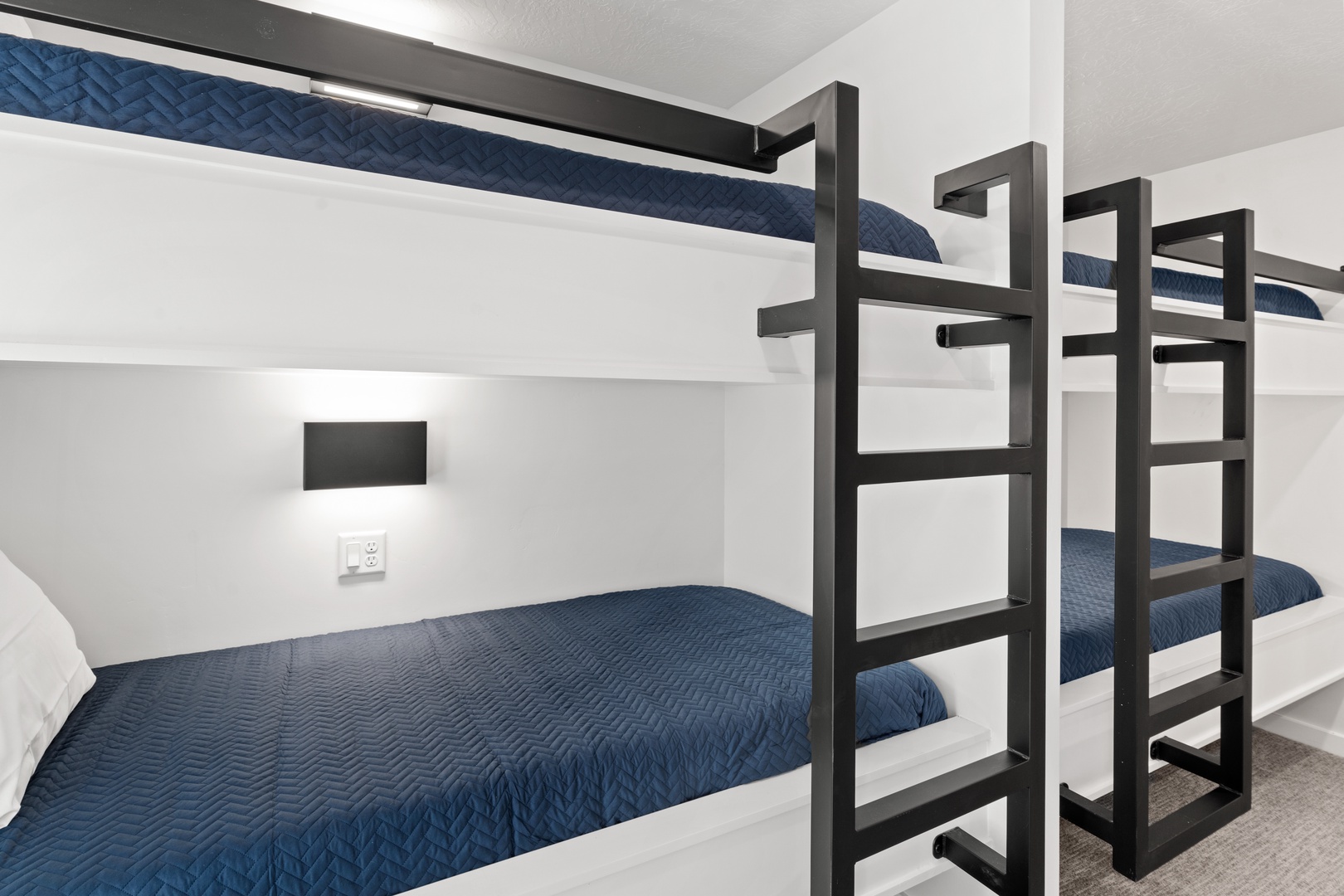 The 3rd-floor bunk suite, with full-over-full & twin bunks, ensuite, & smart TV