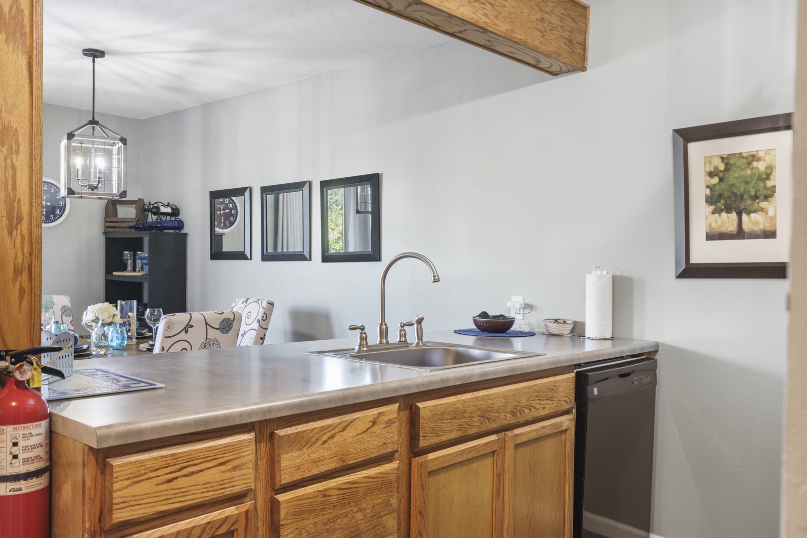 The open, airy kitchen offers ample space & every home comfort