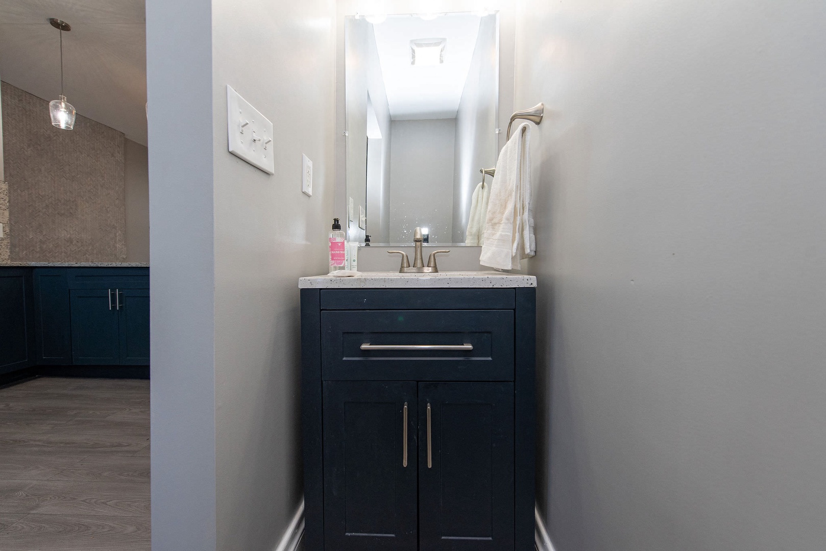 Suite 2 – A convenient half bath is tucked away on the main level