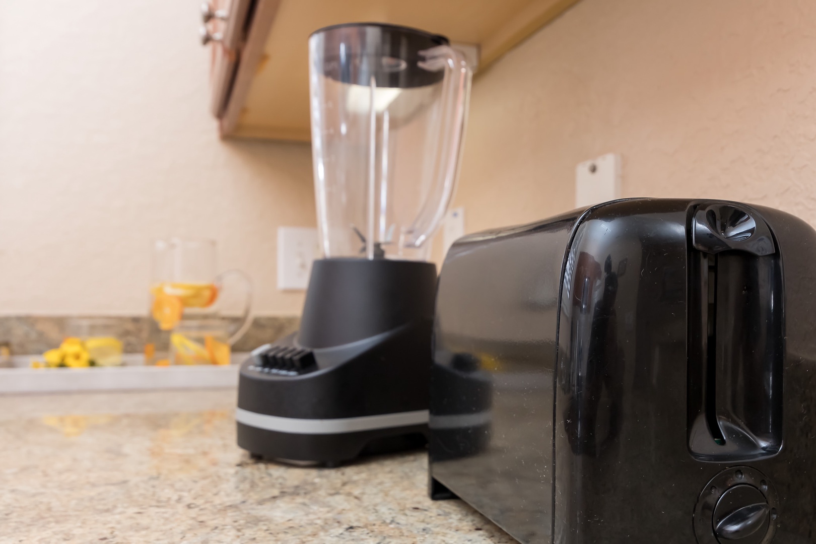 Kitchen's extra items such as a blender, toaster, and coffee maker