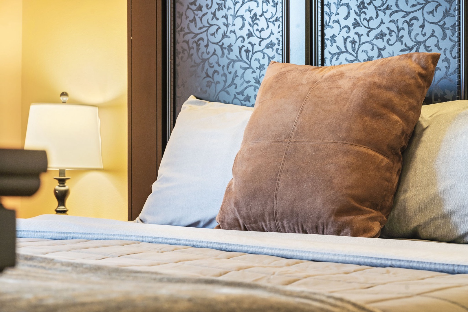 The regal king suite boasts a private en suite, TV, & ceiling fan