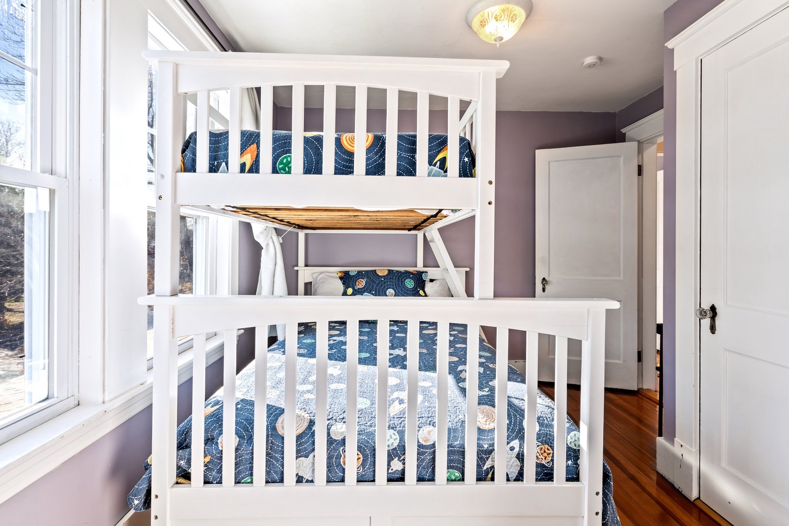 This bedroom retreat offers twin over full bunkbed