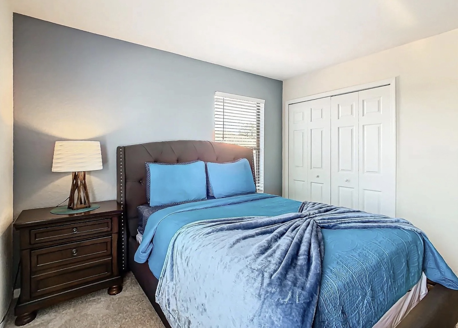 Bedroom 2 with queen bed and TV