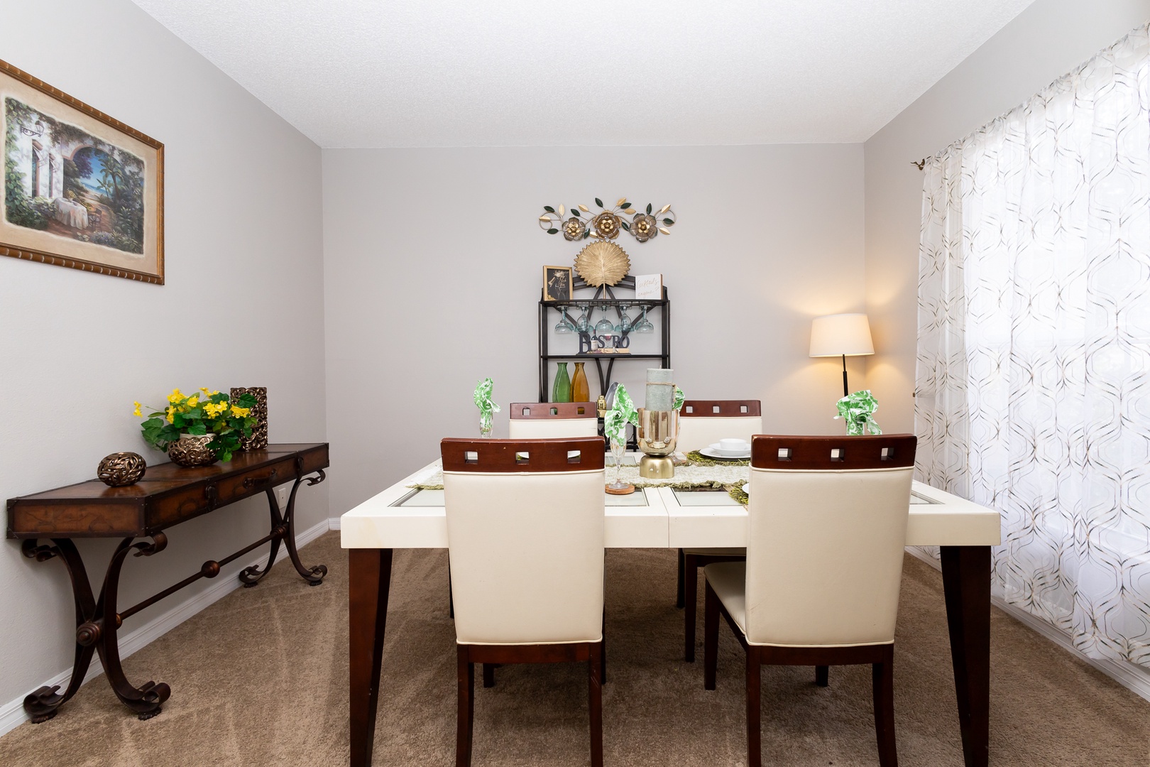 Gather for meals together at the formal dining table, with space for 6