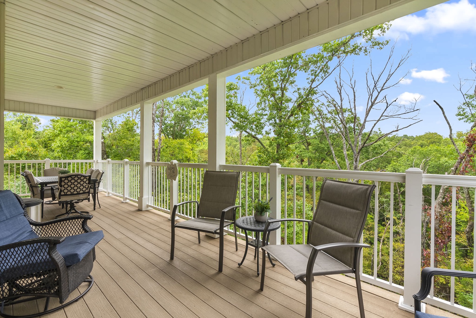 Large deck with outdoor seating and amazing views