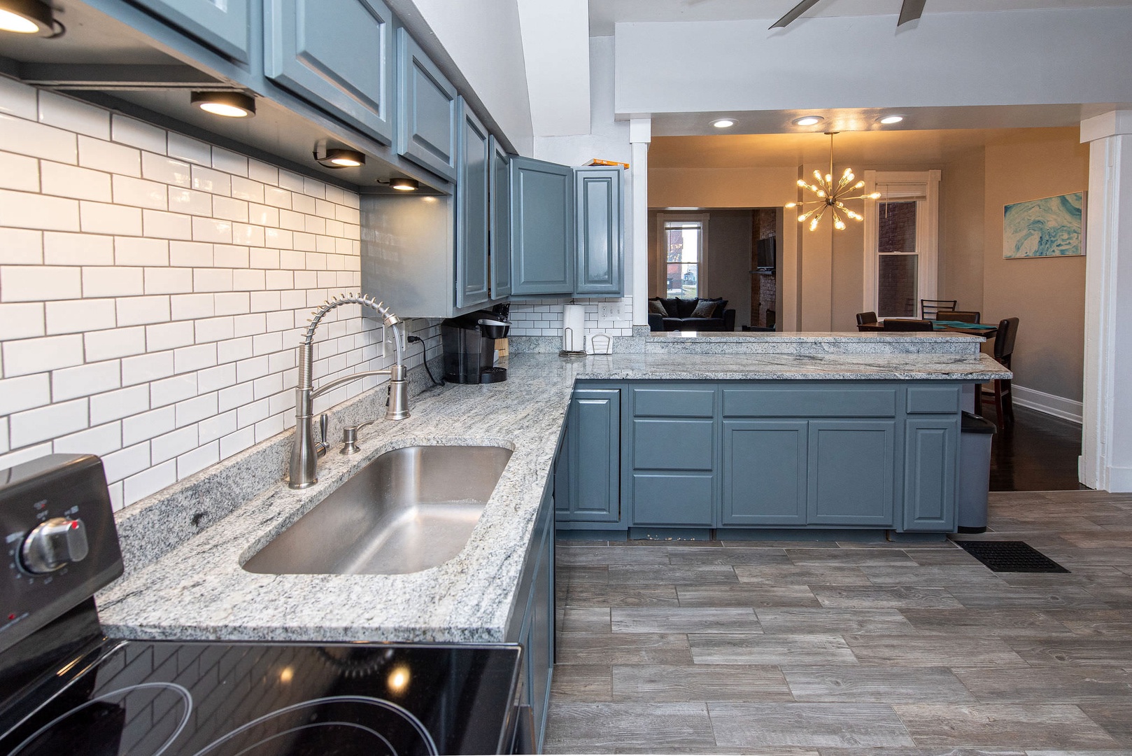 The kitchen offers ample space & all the comforts of home