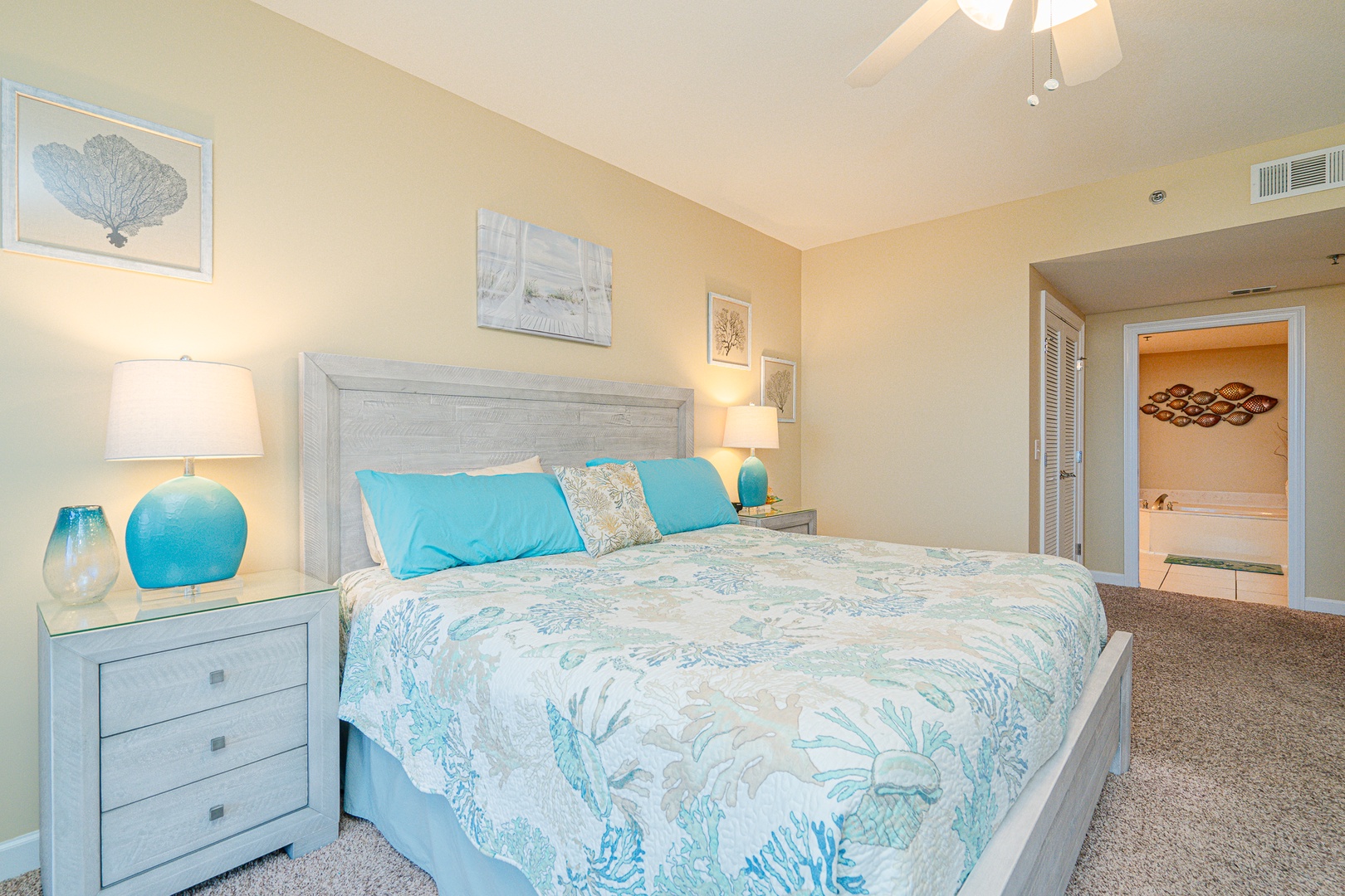 The king suite boasts a private ensuite, TV, & gorgeous water views