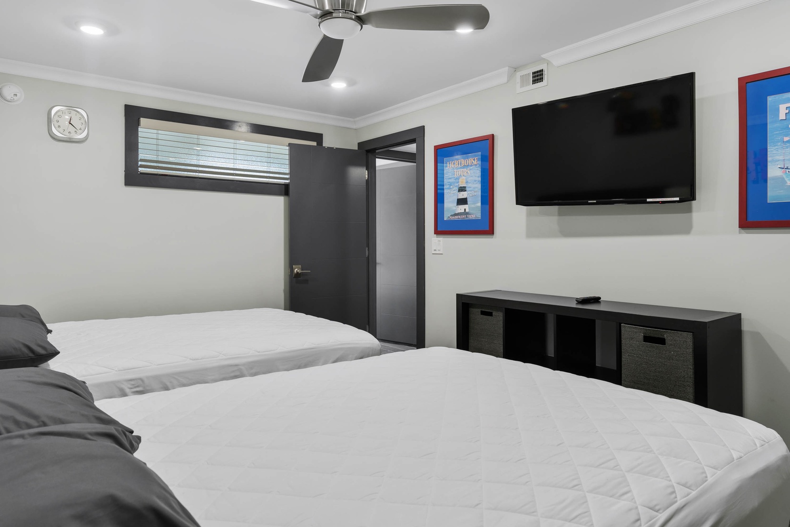 Bedroom 2 with 2 Queen beds, and TV