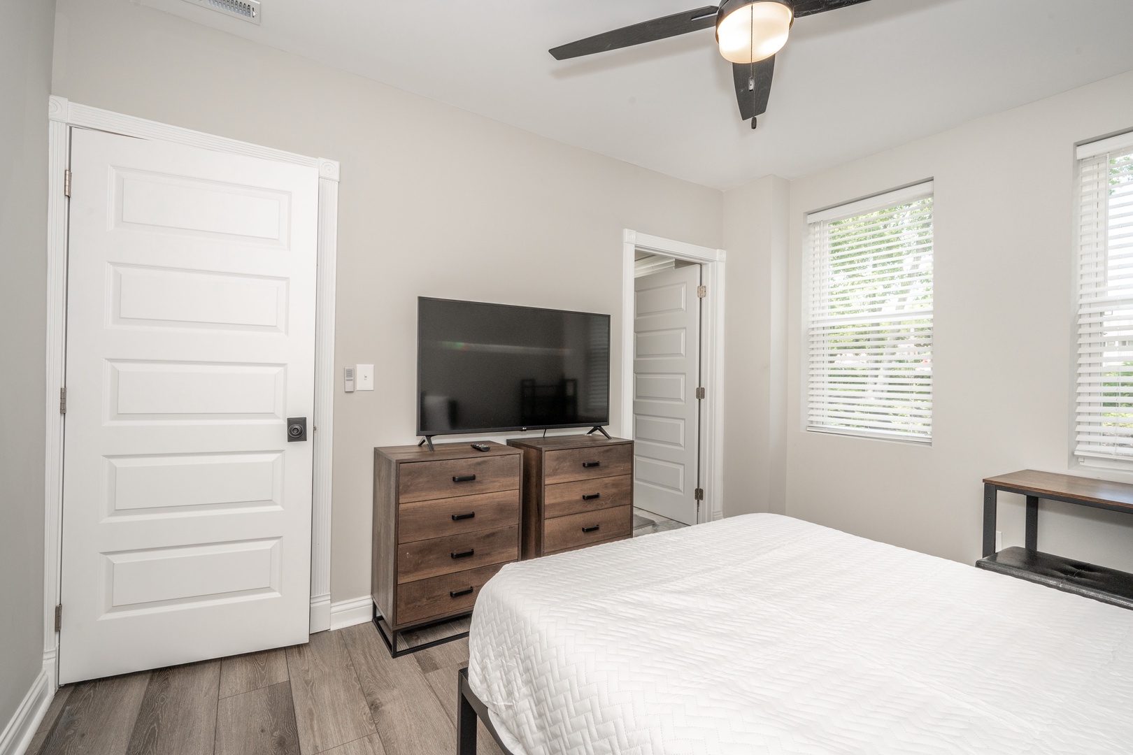 Bedroom #1 with queen bed and attached en-suite bathroom
