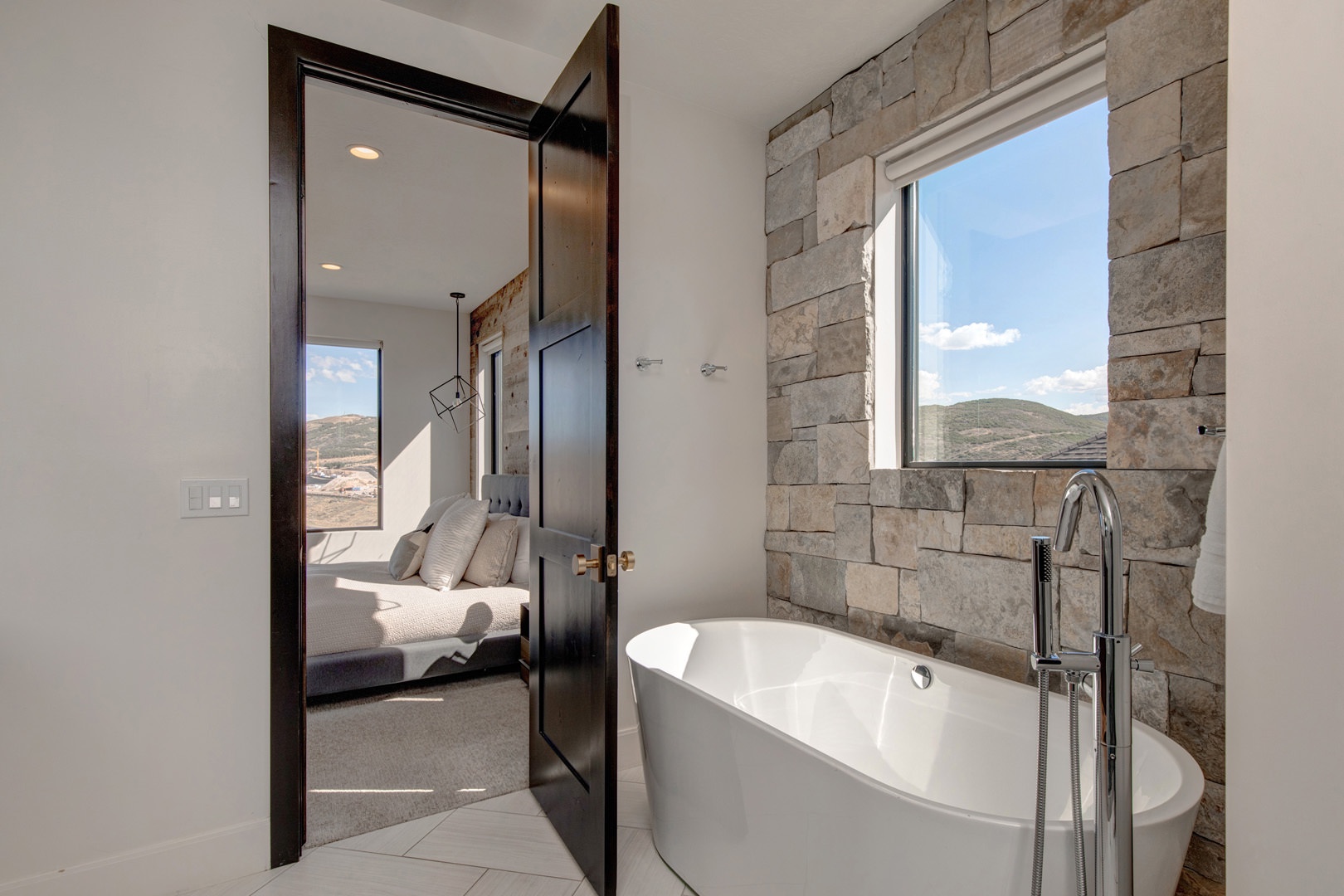 Bathroom #2 with shower and tub attached to bedroom #1