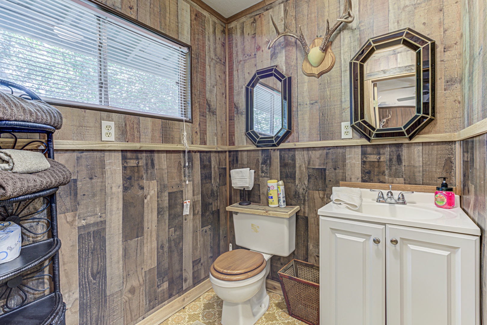 A full bath with single vanity & walk-in shower awaits in the bungalow