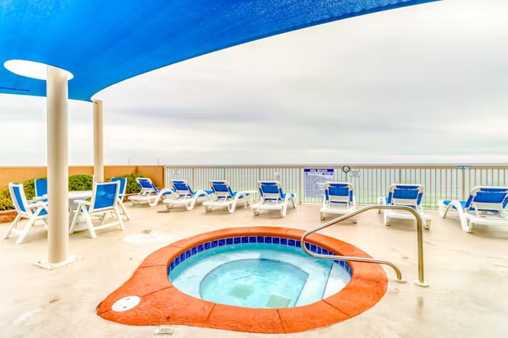 Bask in bubbling bliss with ocean views in the community hot tub