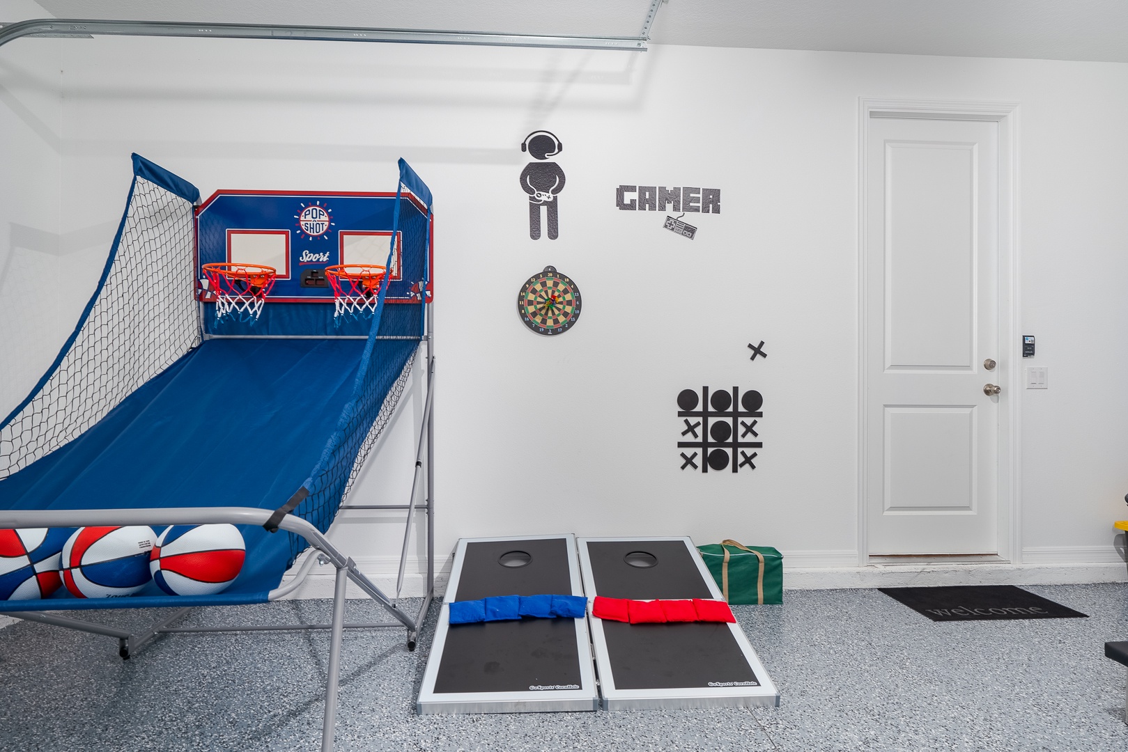 Head into the garage game room & unleash your competitive side