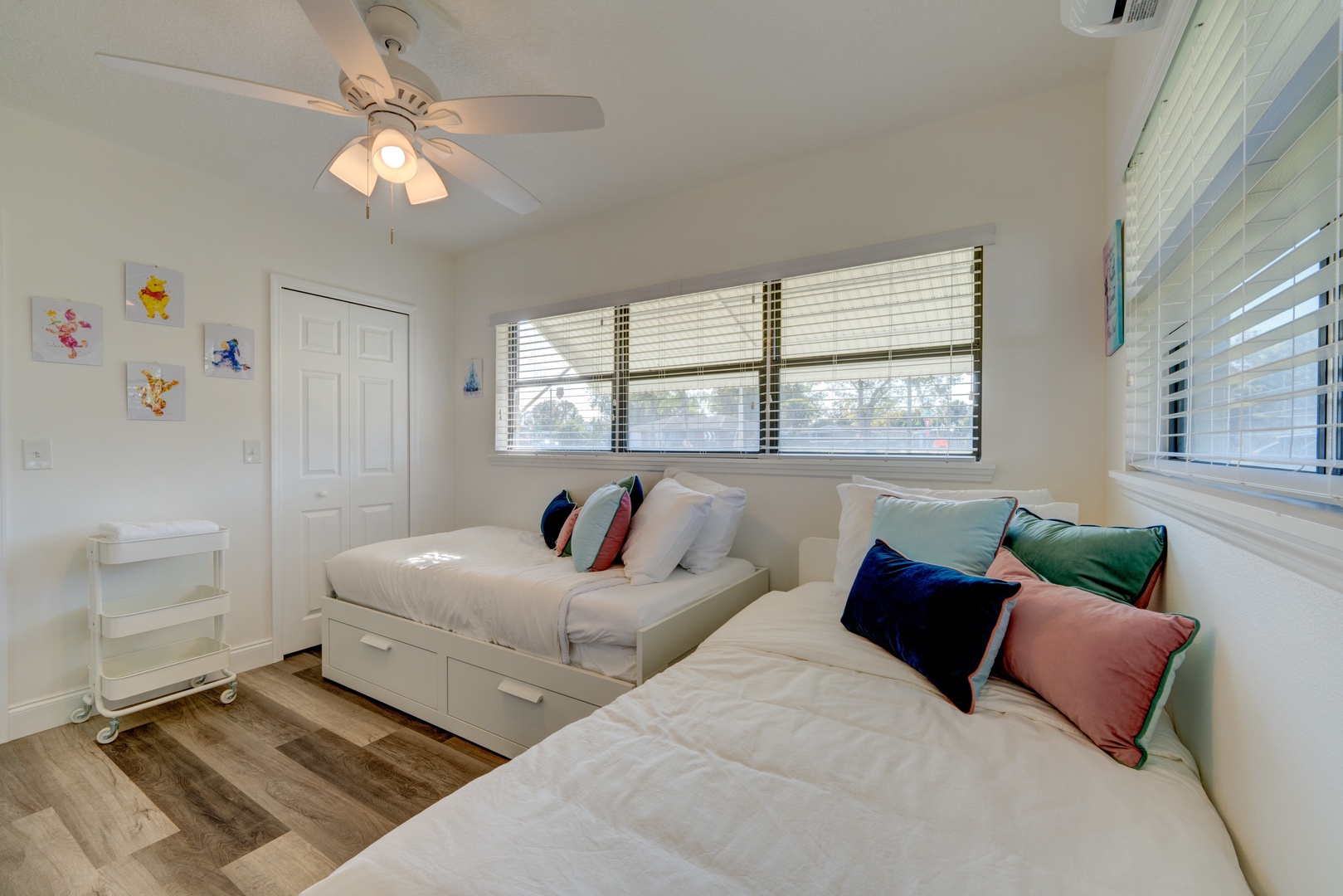 Double twin bedroom (optional king bed conversion) features a smart TV & a ceiling fan