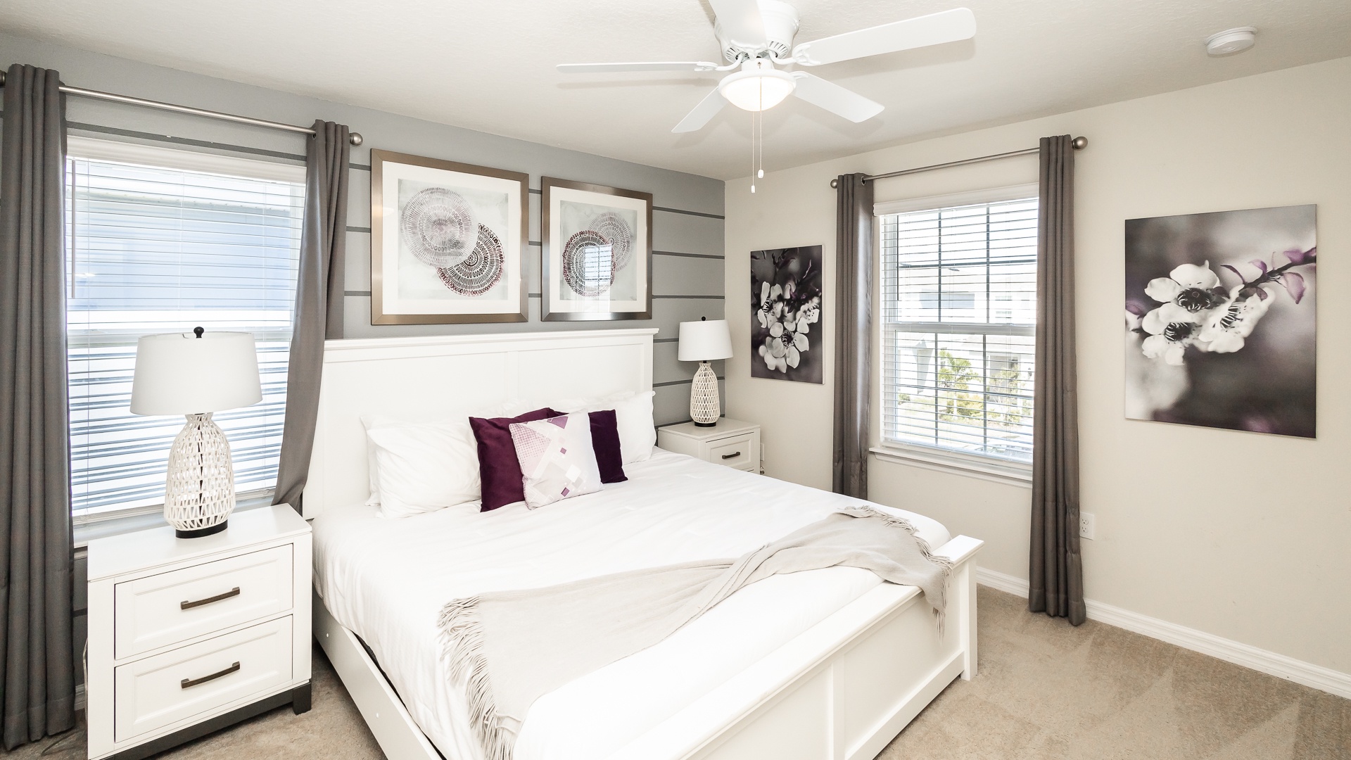 This chic 2nd floor king suite offers a private en suite, Smart TV, & ceiling fan