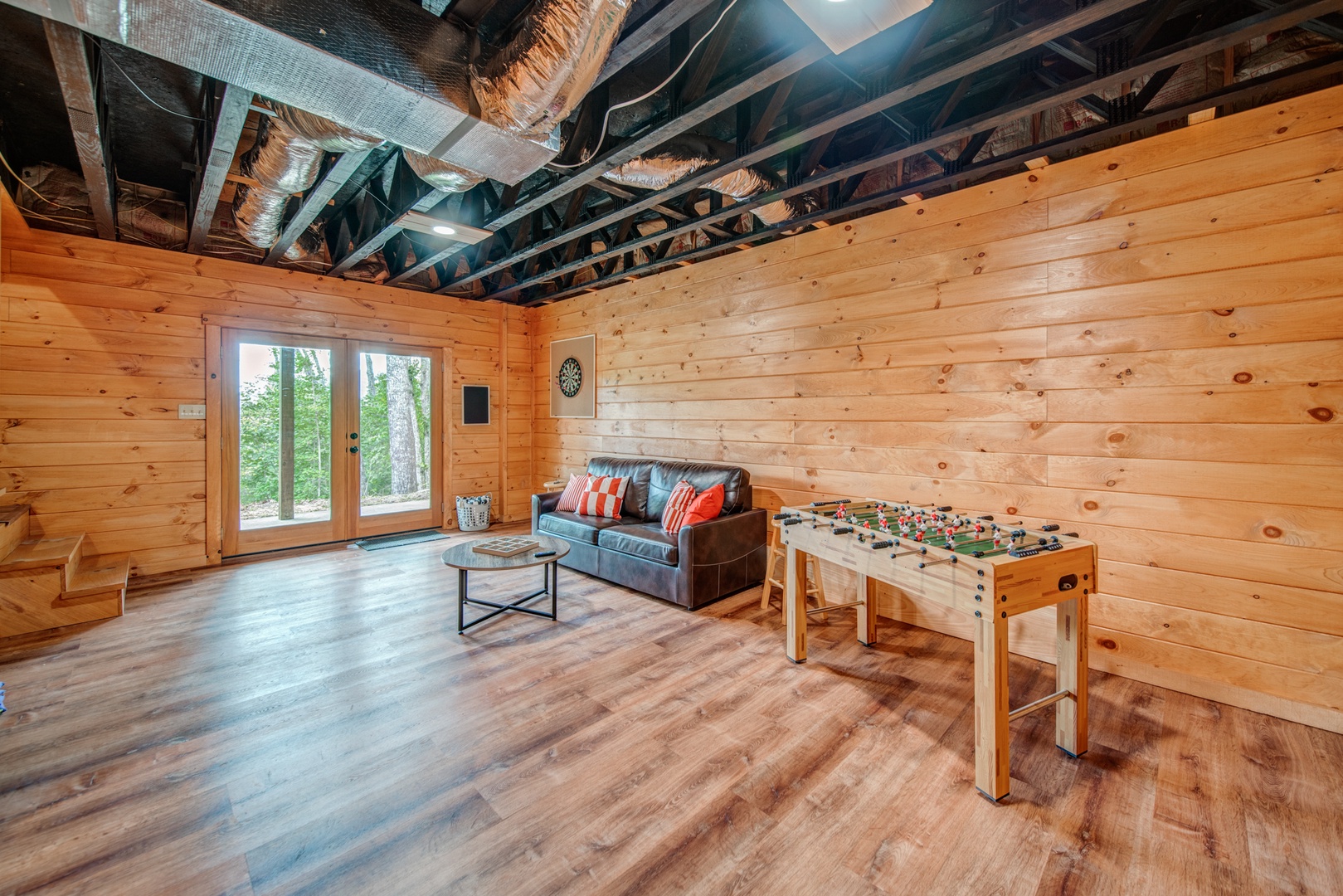 Get competitive with cornhole, foosball, & darts in the game room