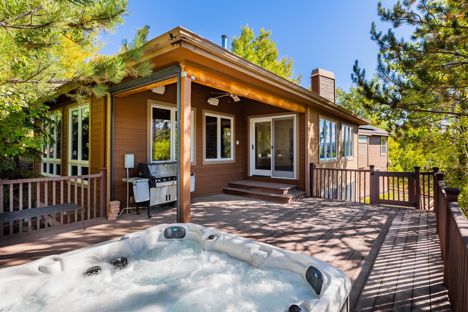 Enjoy a dip in the hot tub and some time grilling out while taking in the foliage views!