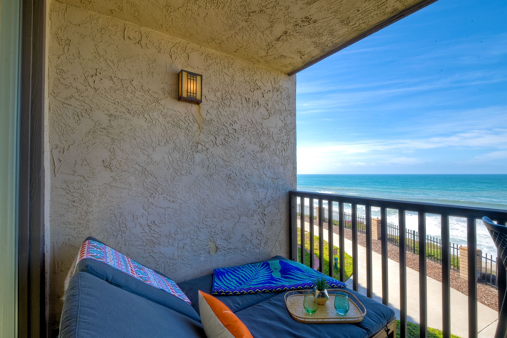 Lounge the day away or dine alfresco with ocean views on the balcony