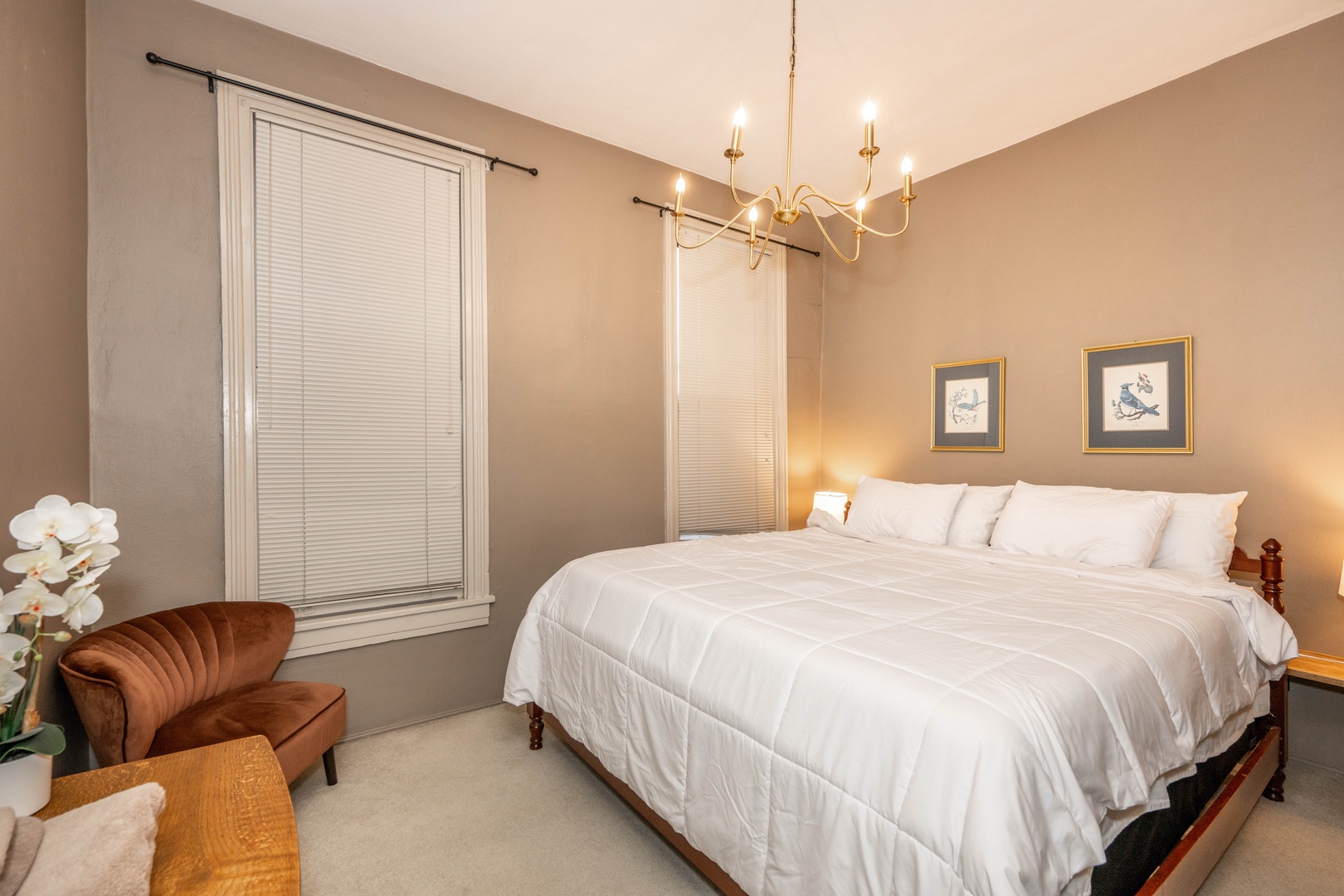 The elegant private bedroom offers a regal king-sized bed