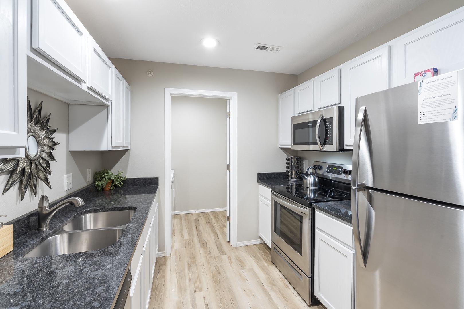 The airy kitchen offers ample space and all the comforts of home