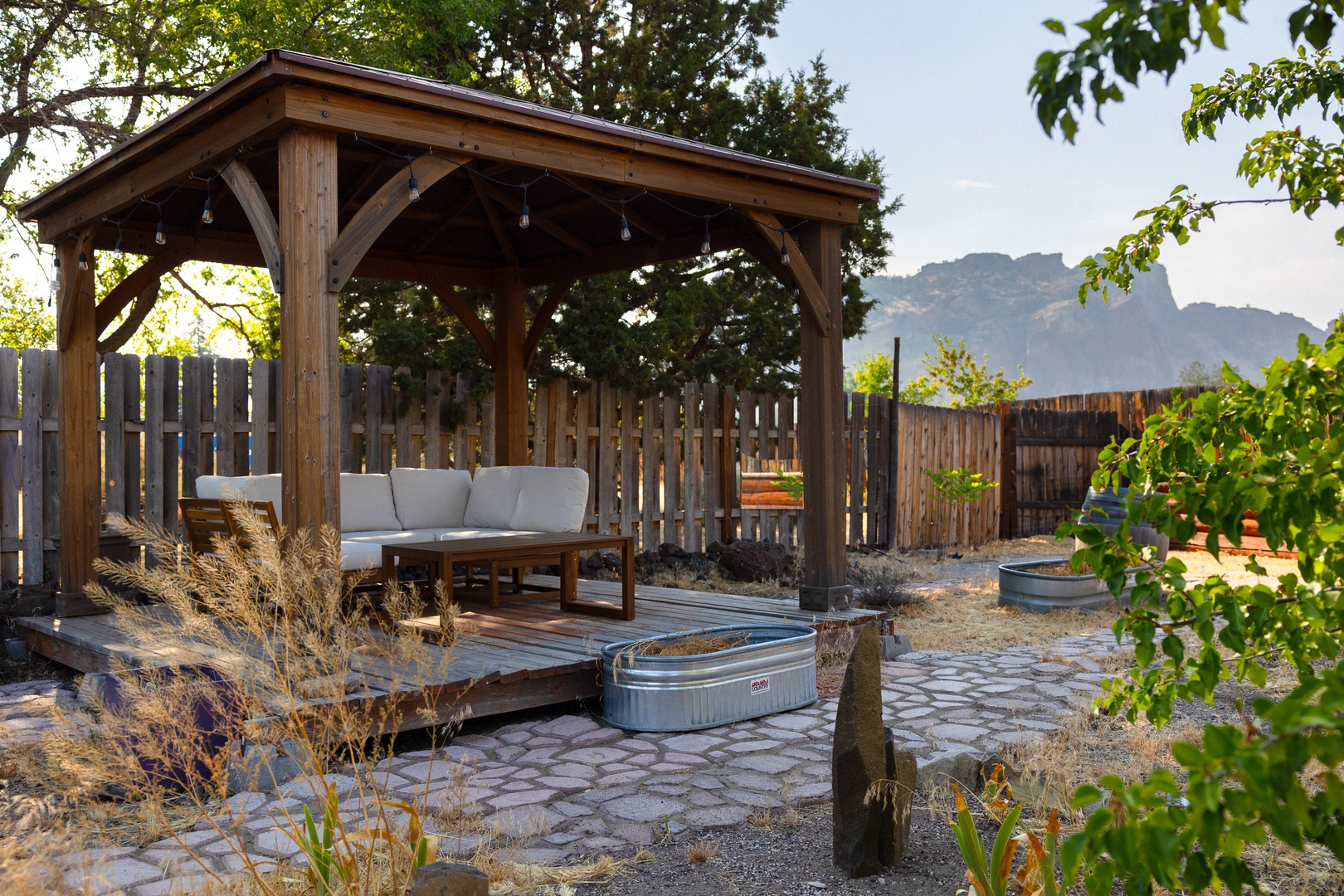 Kick back & relax with gorgeous views under the pergola