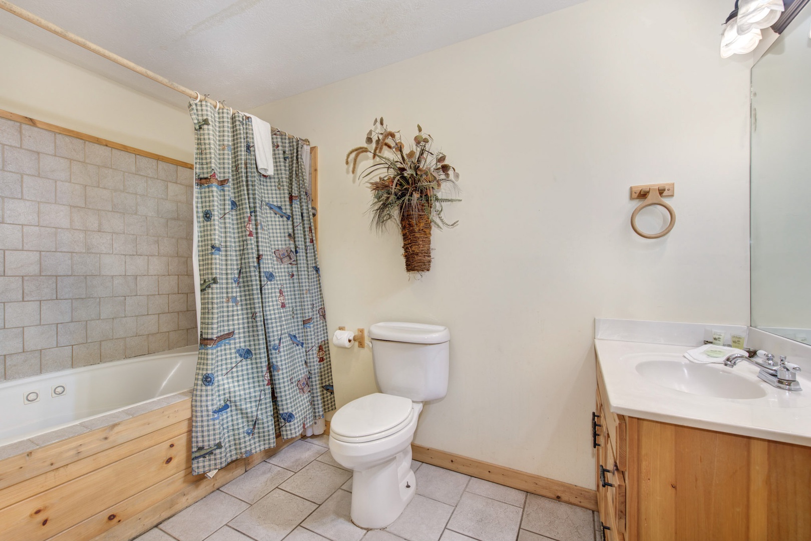 Bathroom 1 with shower/tub combo (lower level)