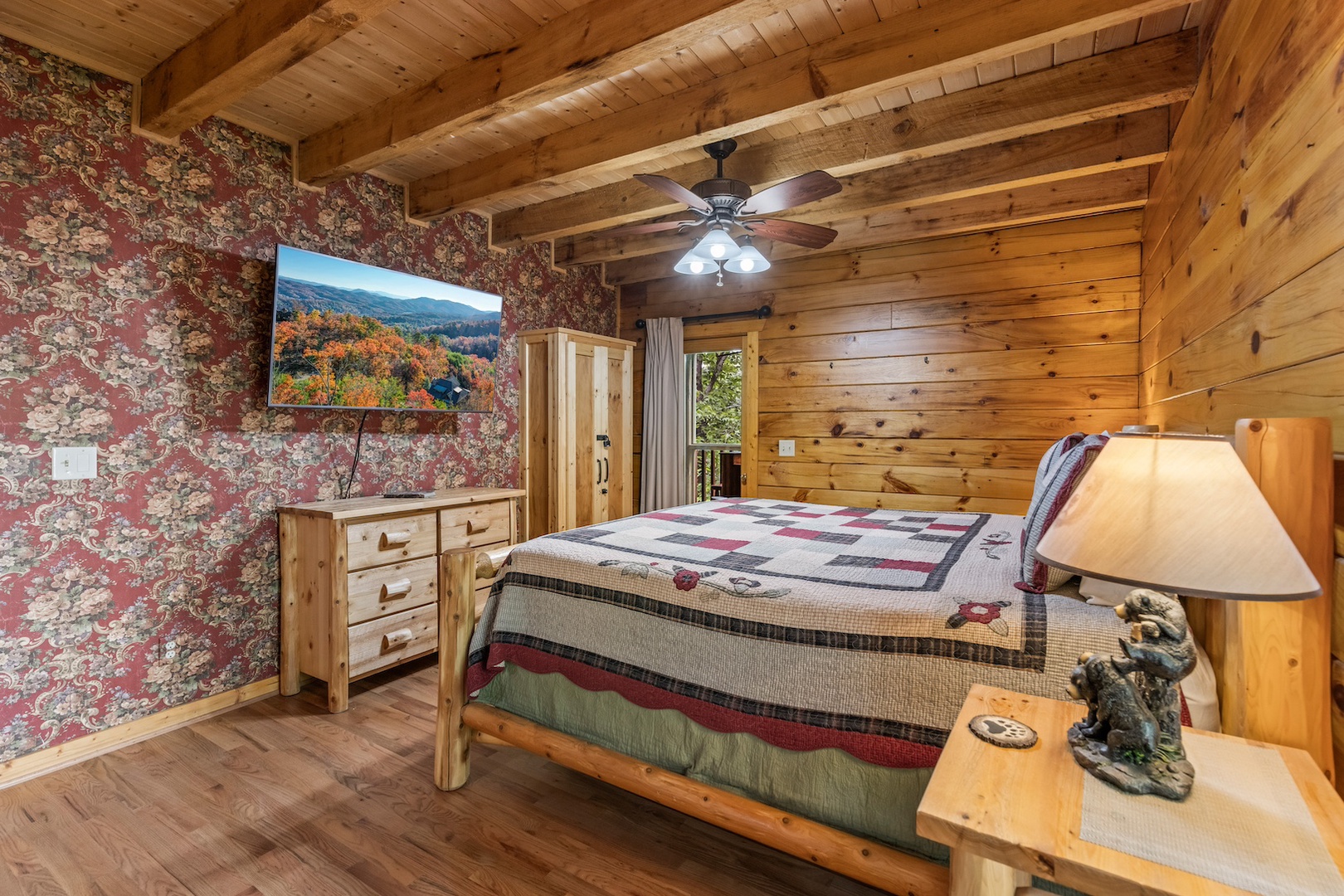 Bedroom 1 with king bed, Smart TV, and ensuite