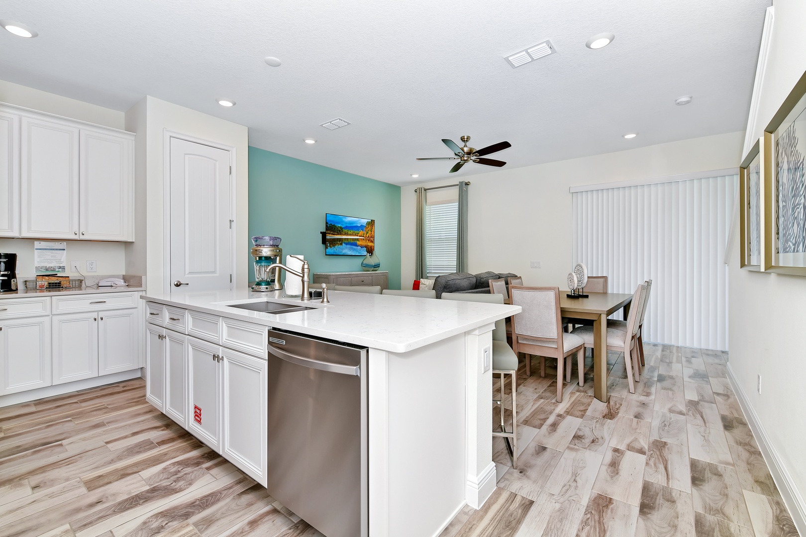 The kitchen offers ample storage space & all the comforts of home
