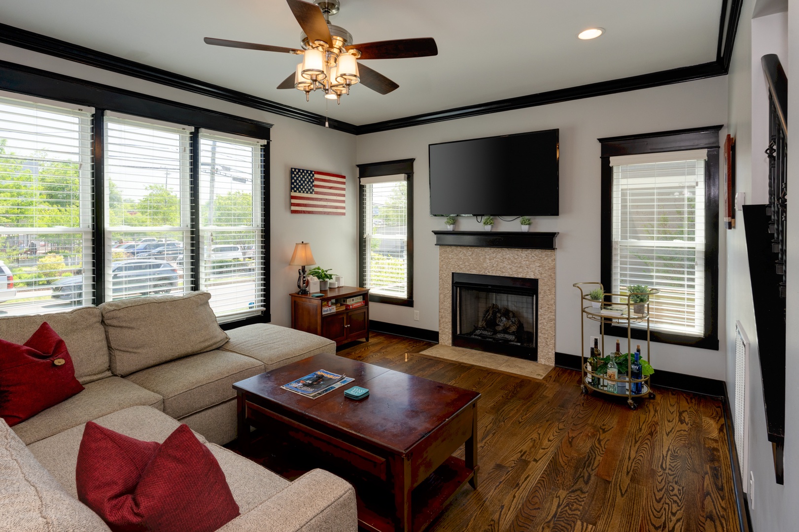 The Living Room boasts comfortable seating, a Smart TV, and a warming Gas Fireplace