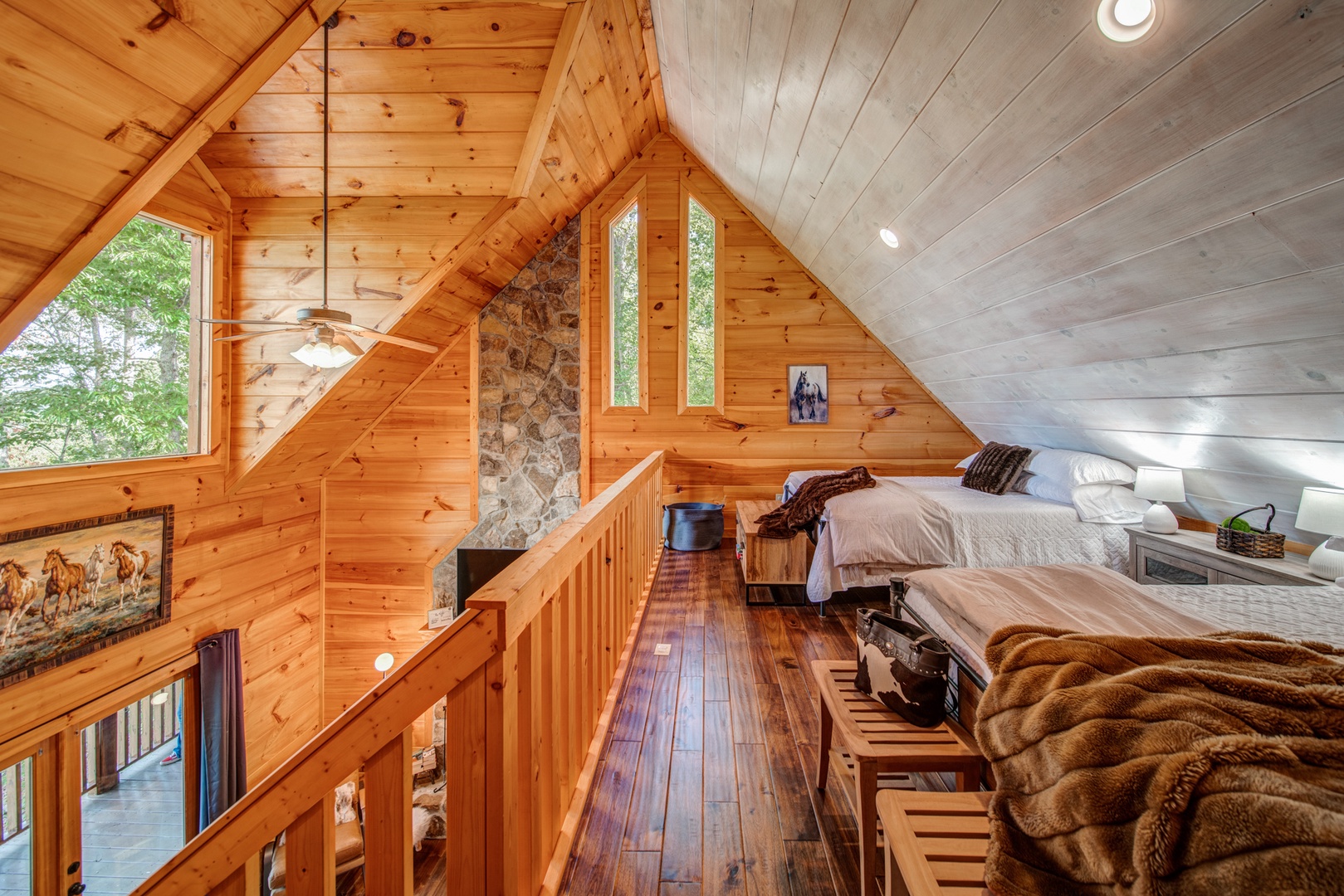 The second-level loft offers a pair of comfy queen beds