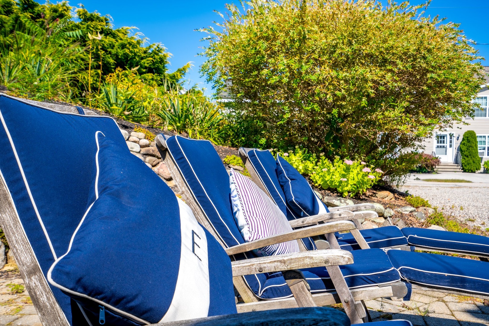 Relax in style with cozy outdoor lounge chairs all around the patio