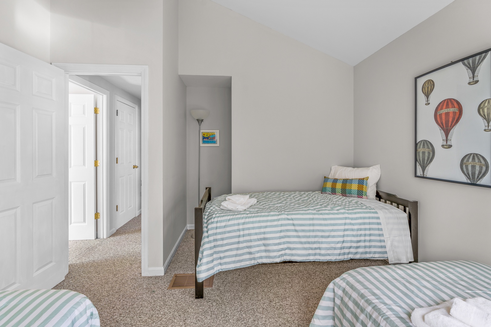 A trio of cozy twin beds is available in the final bedroom