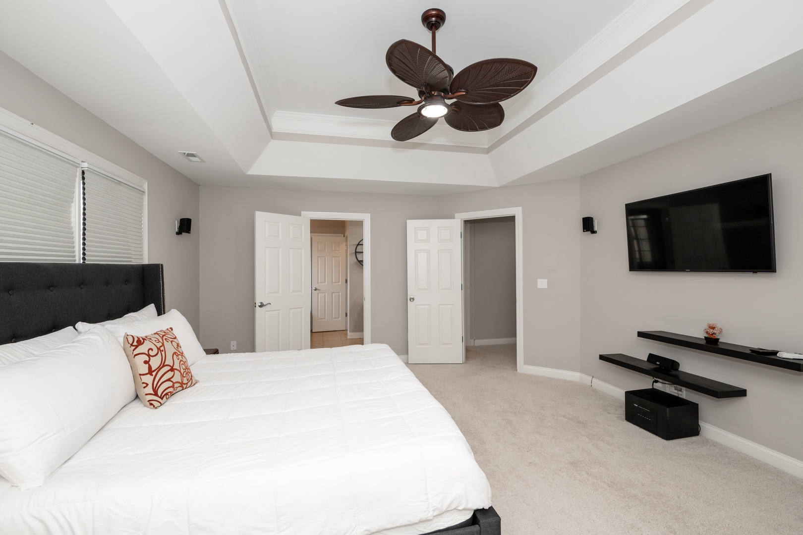 Bedroom 1 with King bed, Smart TV, and en-suite