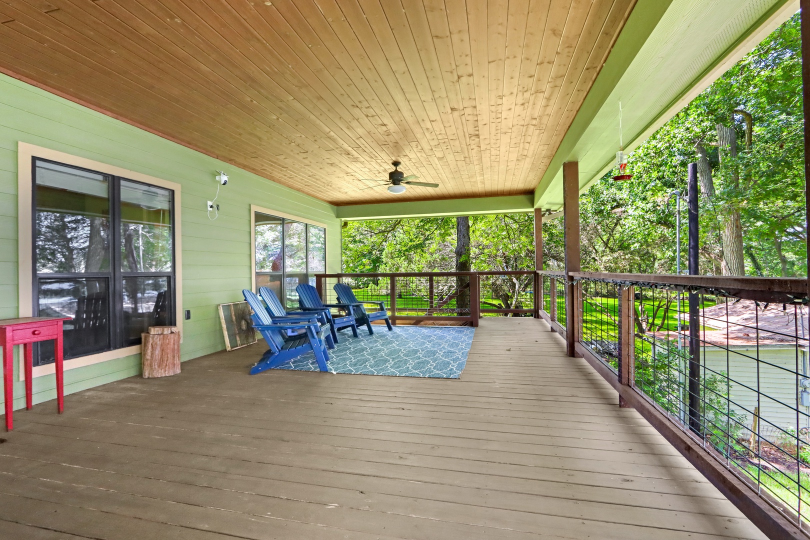 The upper-level deck is the perfect spot for relaxing dinners and drinks