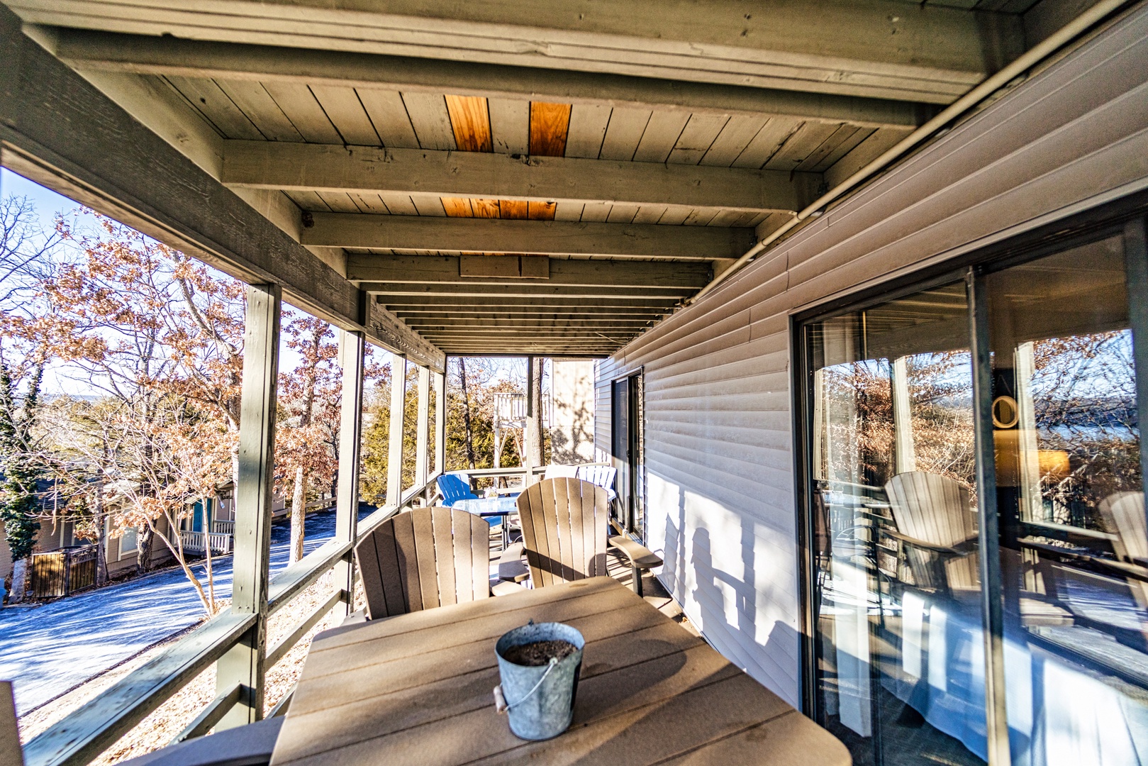 Savor the fresh air and sunshine on the expansive shared back deck