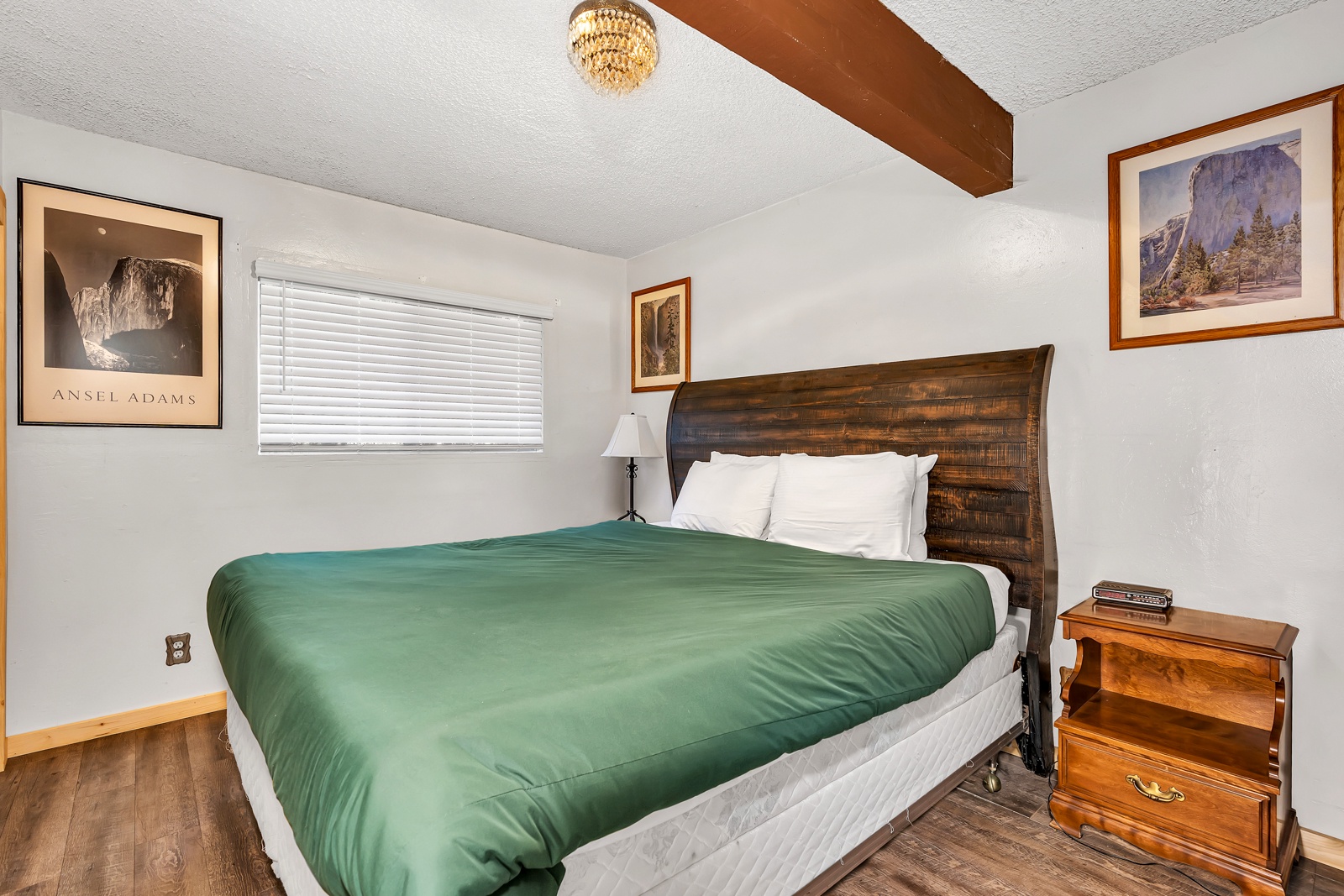 The first of three spacious bedrooms offers a plush king-sized bed