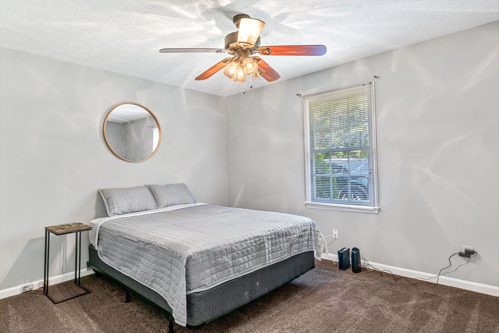 2 of 2 tranquil bedrooms, offering a comfortable queen bed